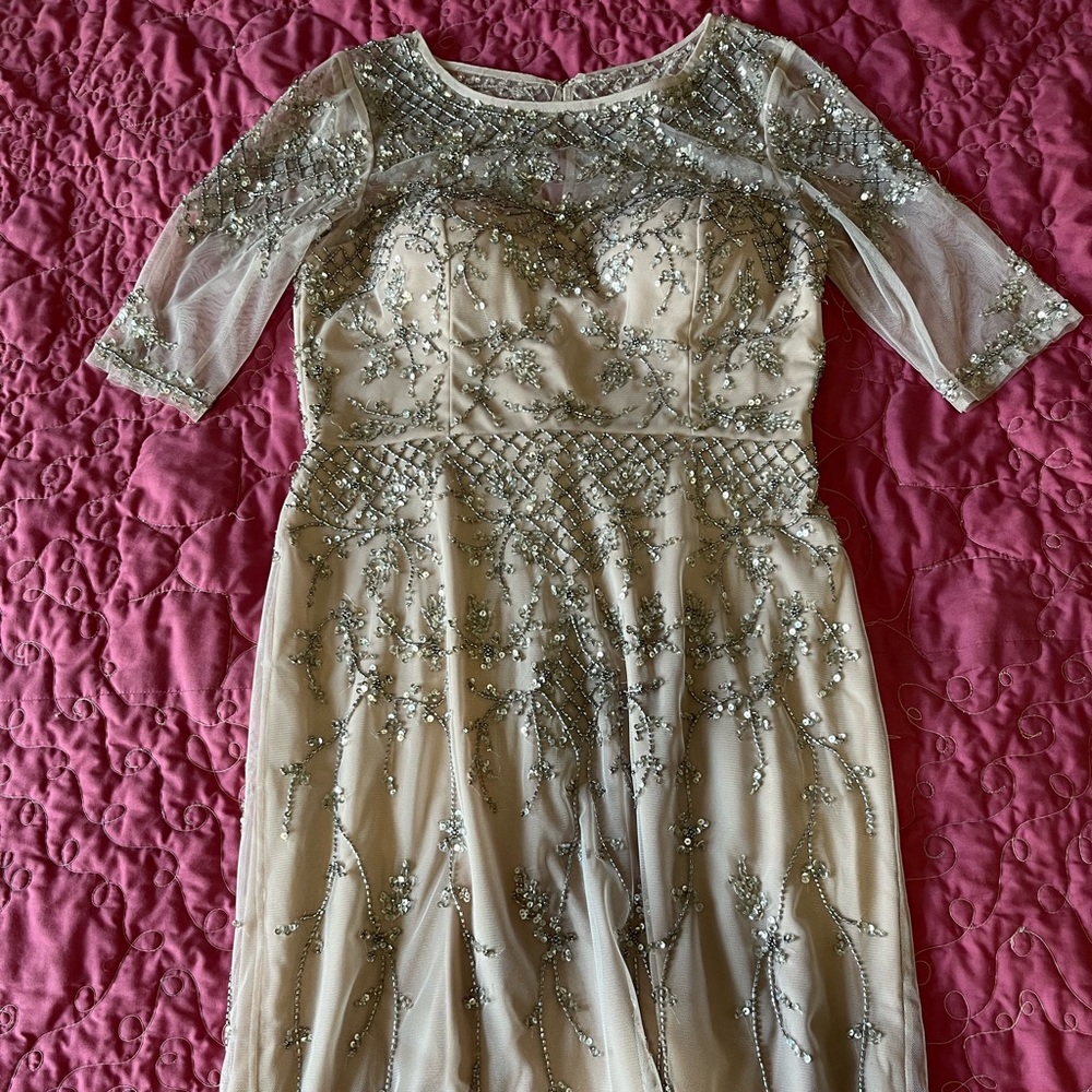 Cocktail dress worn once. Very pale pink size4 Adrianna Papell. Lovely bead work